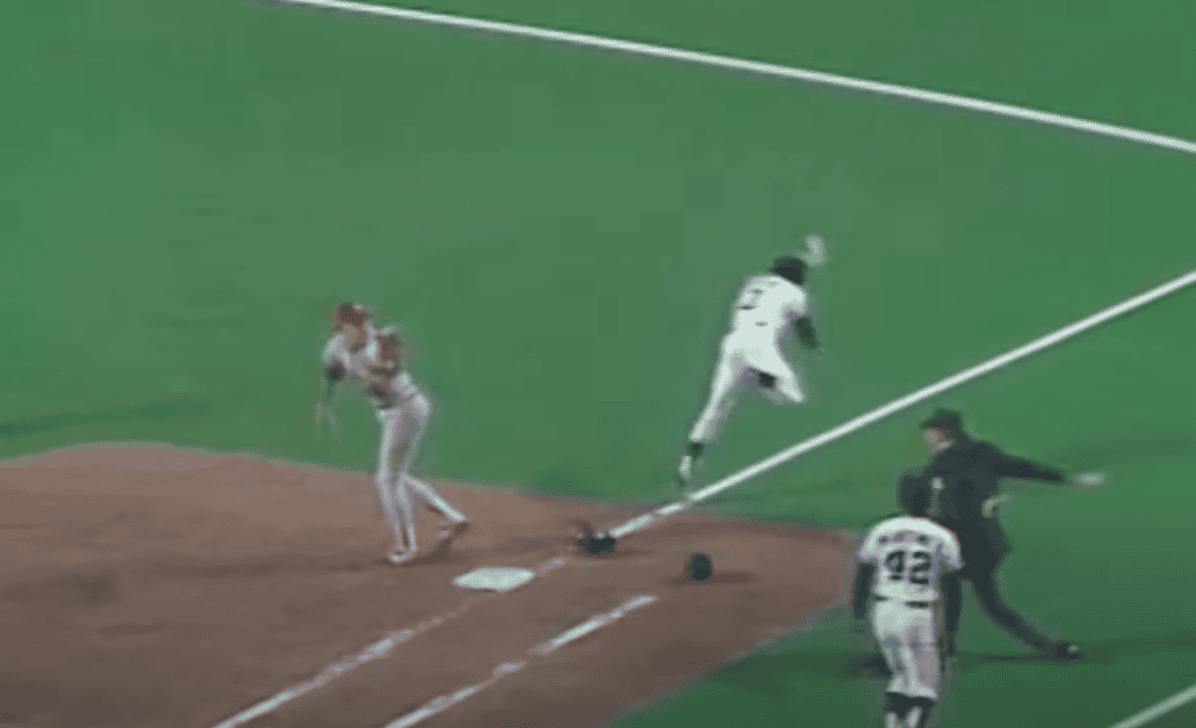 This image captures the moment of Don Denkinger's controversial call in the 1985 World Series, a pivotal umpire mistake.